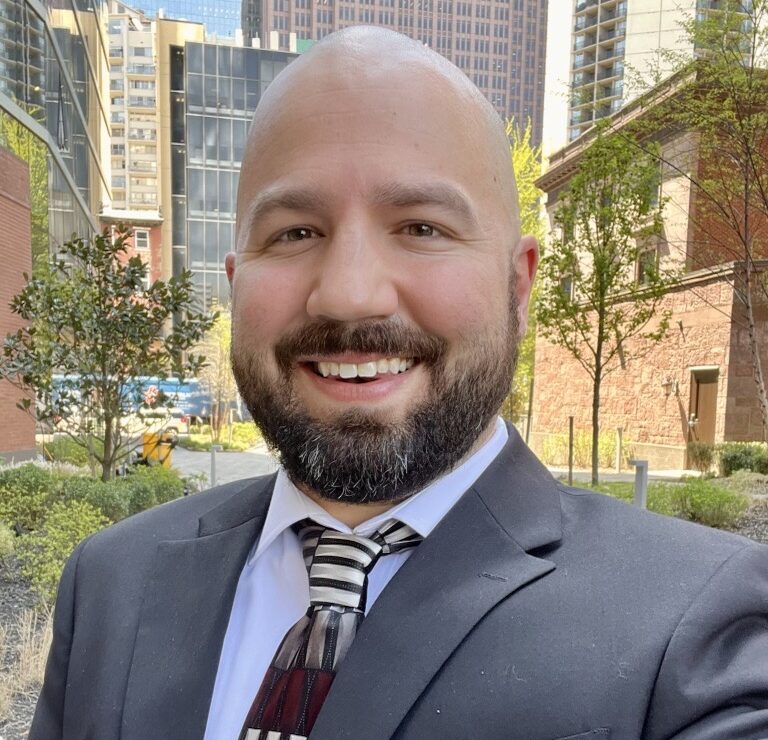 Headshot of Matthew Nienas, Engagement Lead